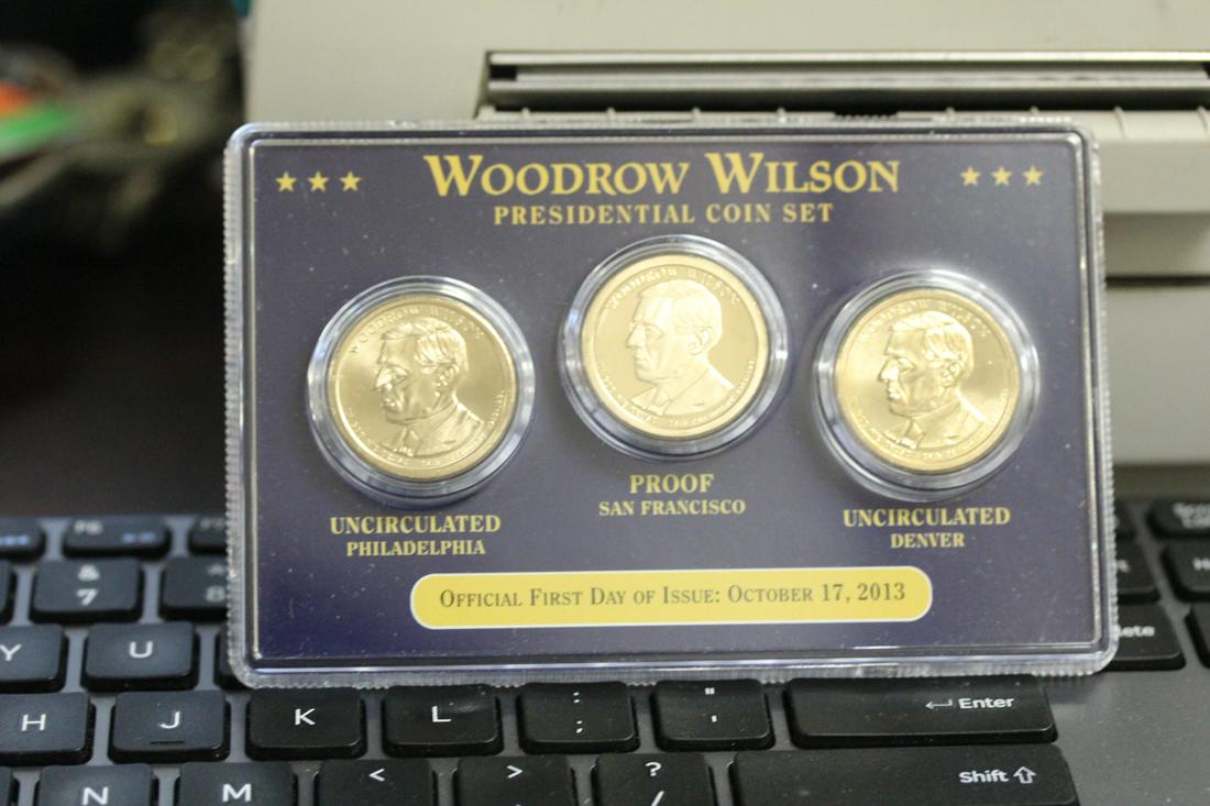 A Woodrow Wilson Presidential Coin Set: middle coin is proof