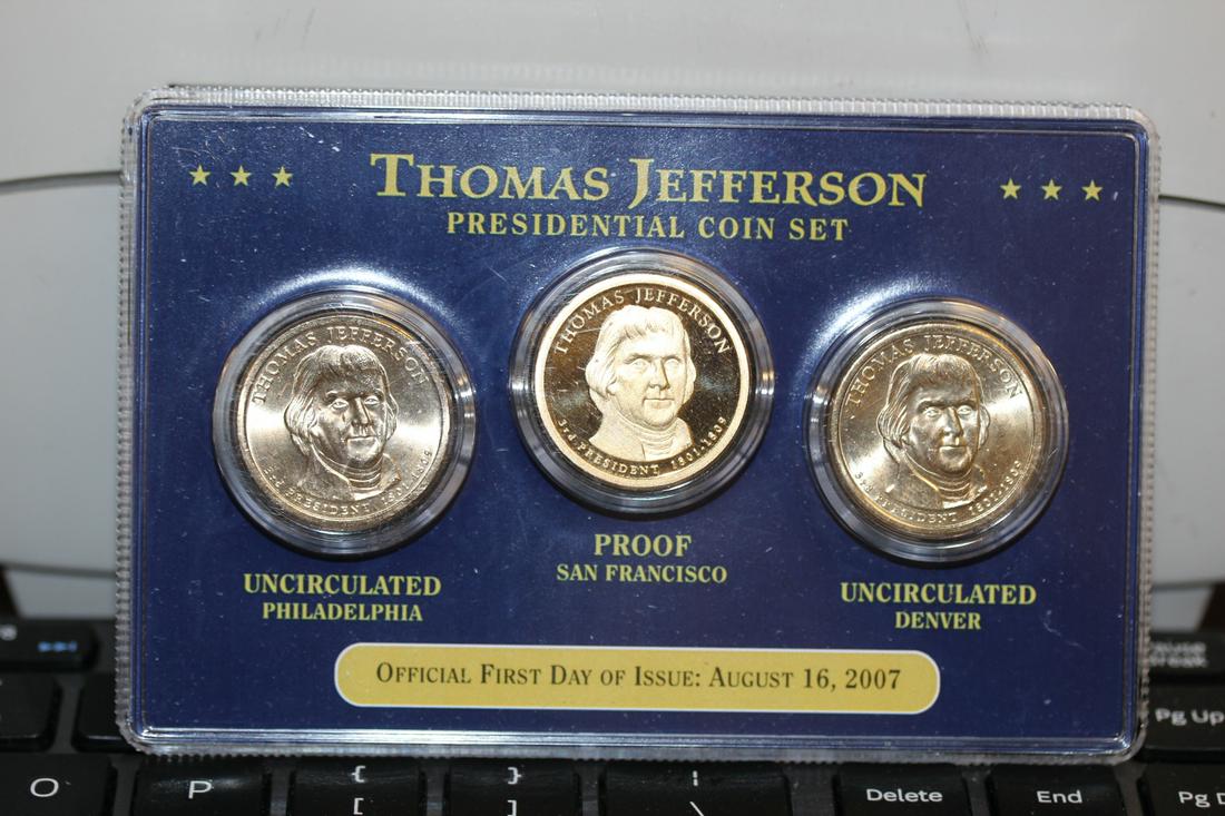 A Thomas Jefferson Presidential Coin Set: middle coin is proof