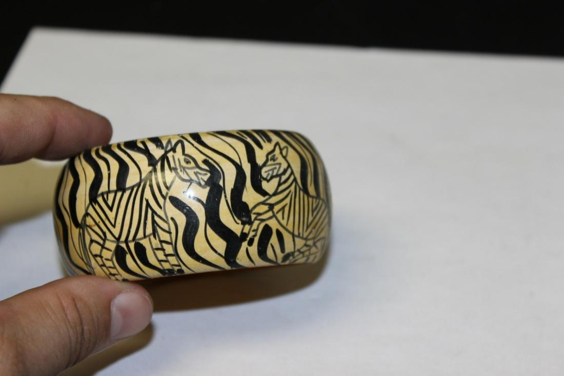 A Zebra Bracelet: Material Unknown - Possibly organic/bakelite - inside diameter= 2 1/2"