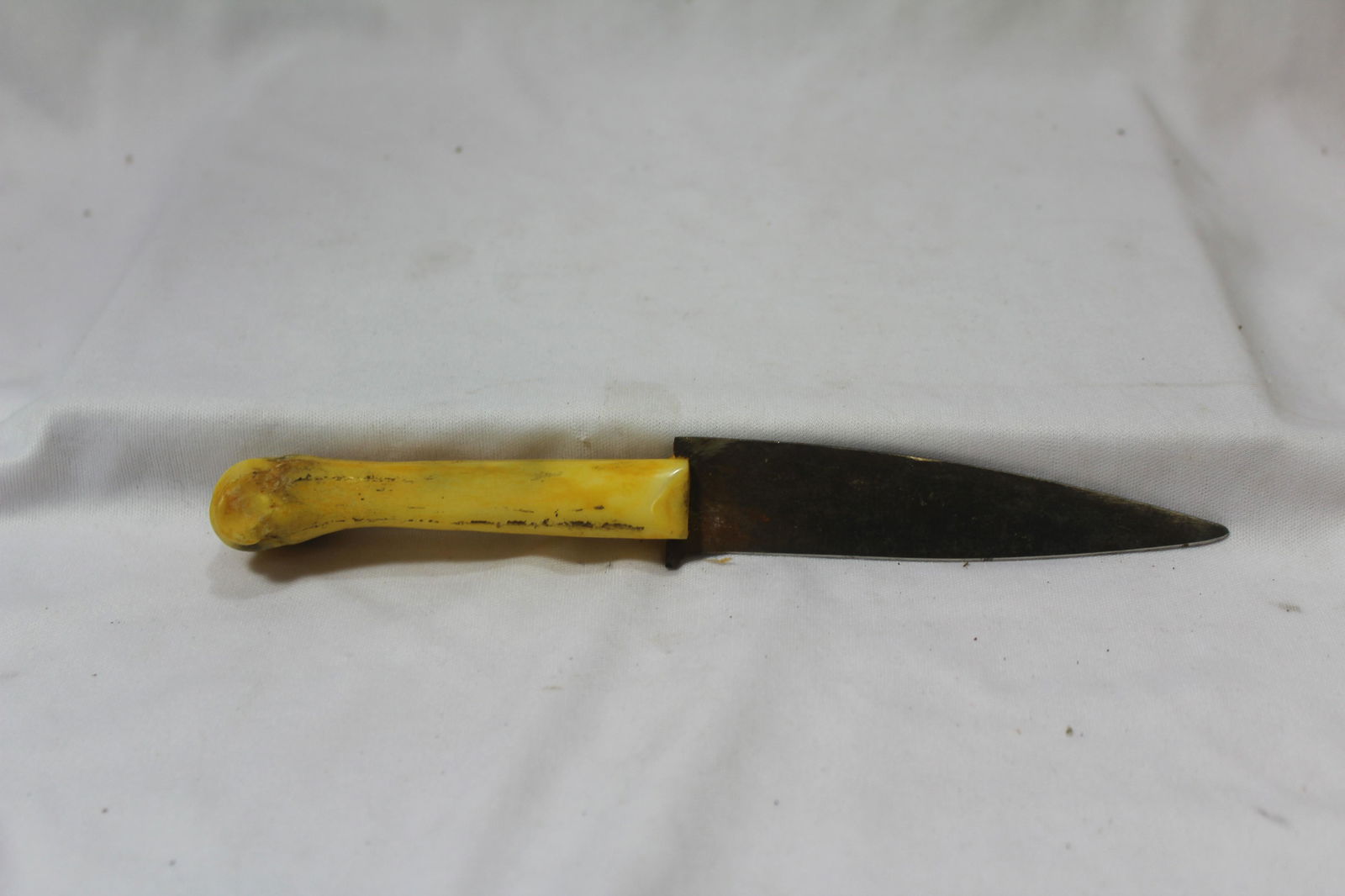 A Bone Handle Knife: 8 5/8" long