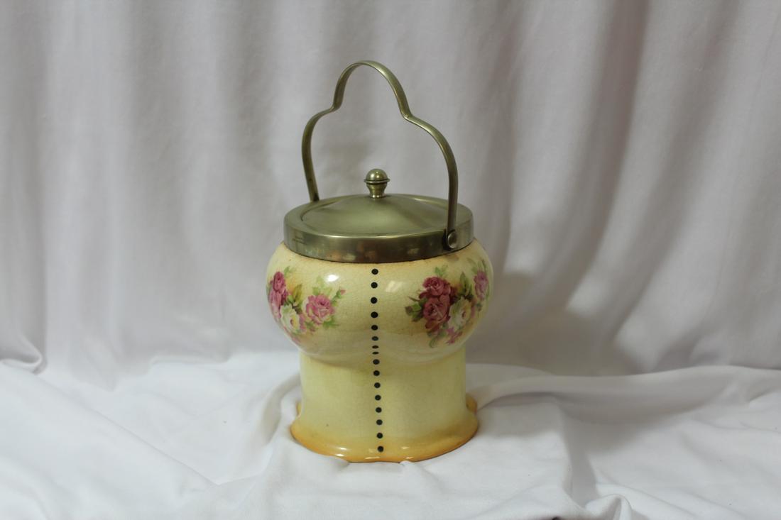 A Vintage Biscuit Jar with Lid: please note: bottom chip, not noticeable when right side up - 7" tall