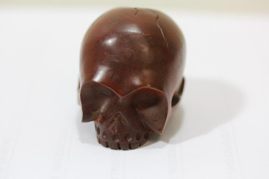 A Wooden Japanese Skull Netsuke: signed - 1 7/8" across