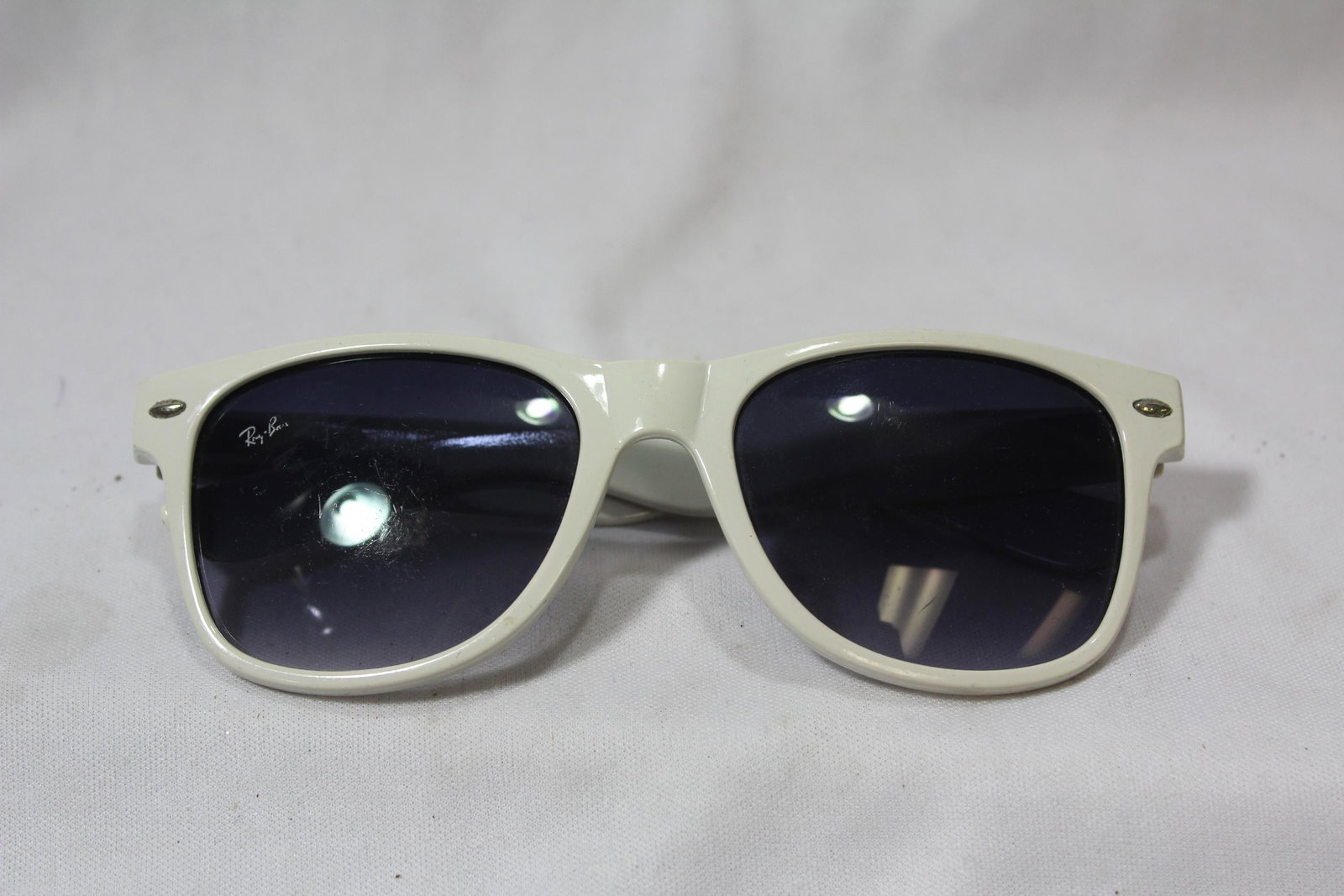 A Ray Ban White Frame Sunglasses: as shown