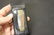 A Pocket Knife Inside a Leather Case - 6