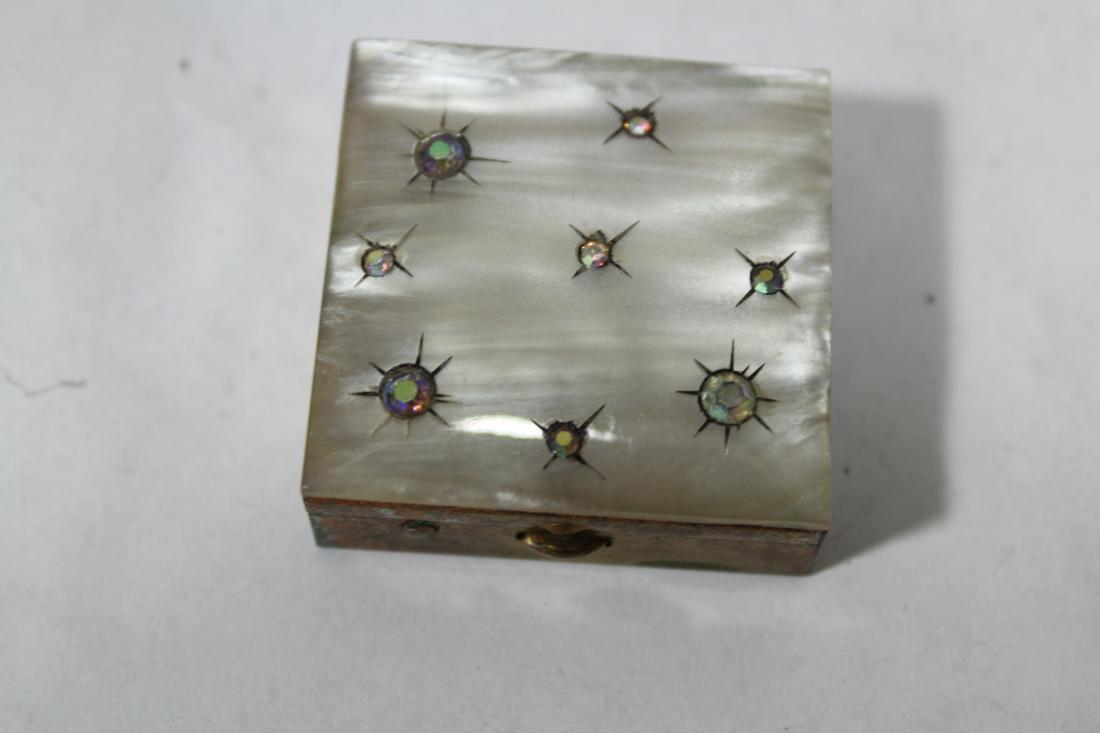 A Metal and Mother of Pearl Pill Box: 1 1/2" square