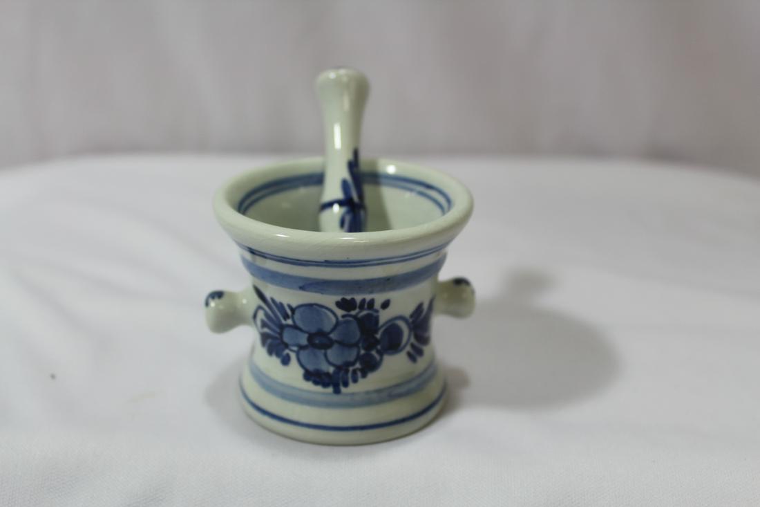 A Delft Aphotecary Mortar and Pestle: Mprtar= 2 1/4" tall