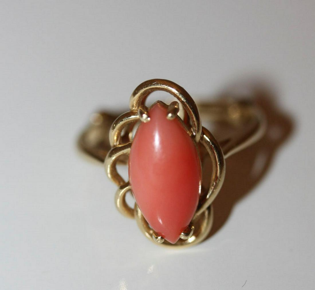14K Coral Lady's Ring: Size 6. Coral measures 13mm at widest point. Total weight is 3.1g.