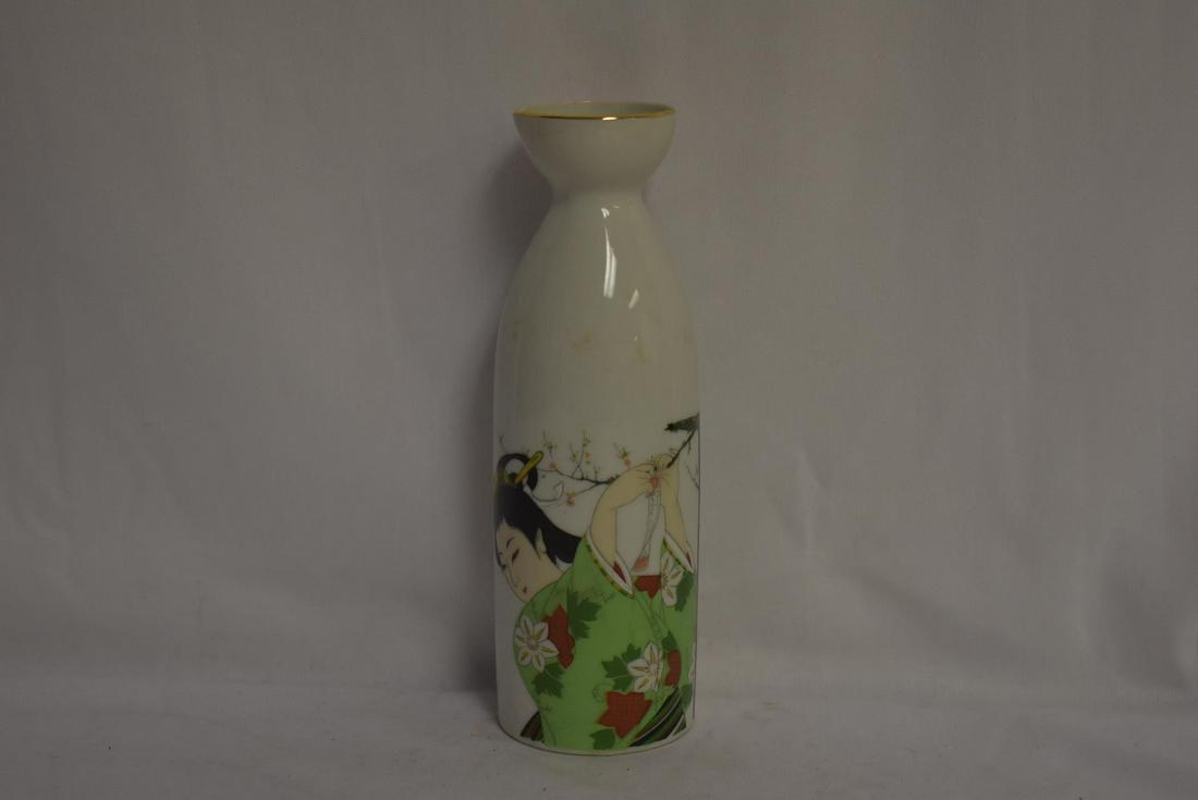 A Saki Bottle: 7" tall - signed