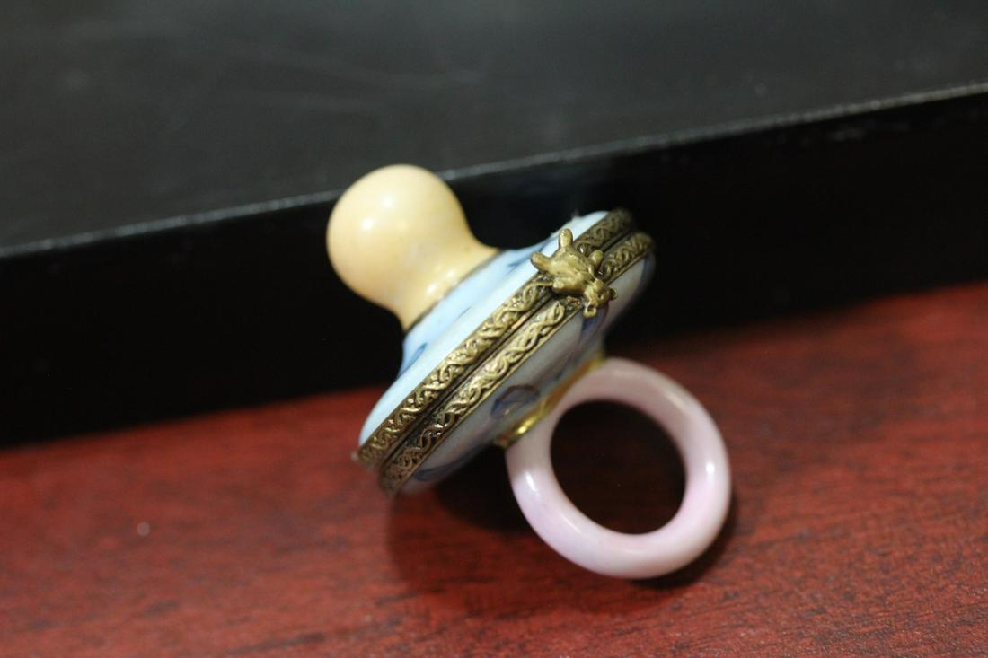 A Limoge Pacifier Shape Trinket Box: handpanited - 1 3/4" long