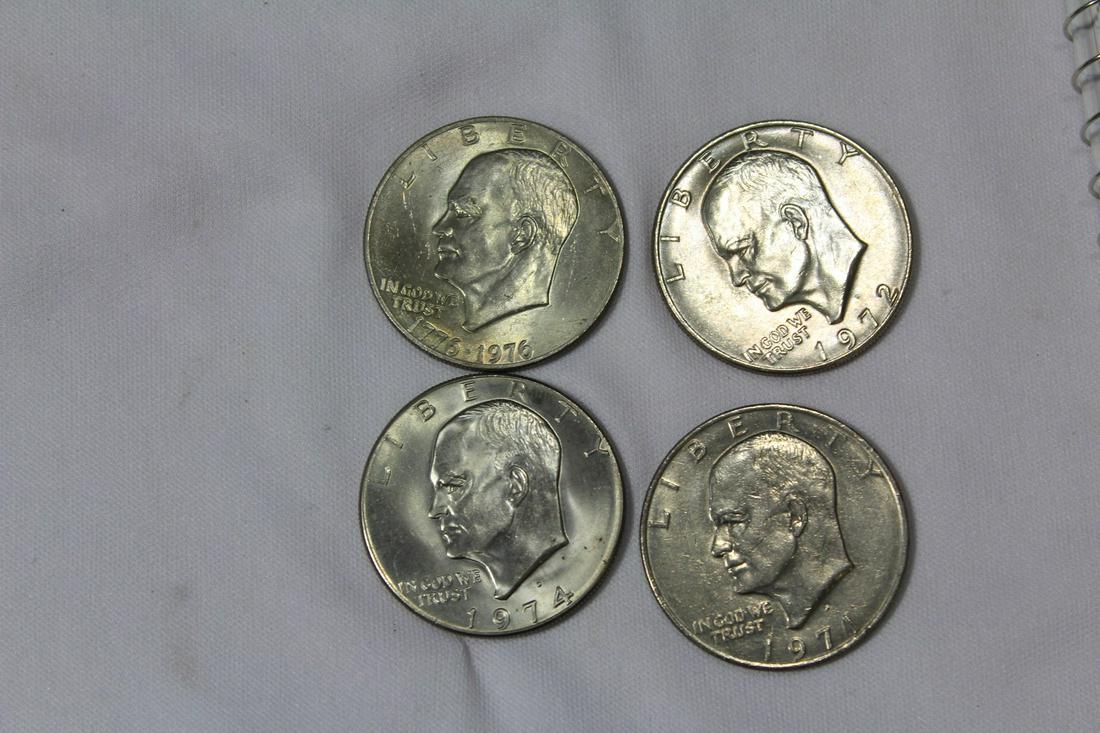 Lot of 4 Clad Ike Dollars: as shown
