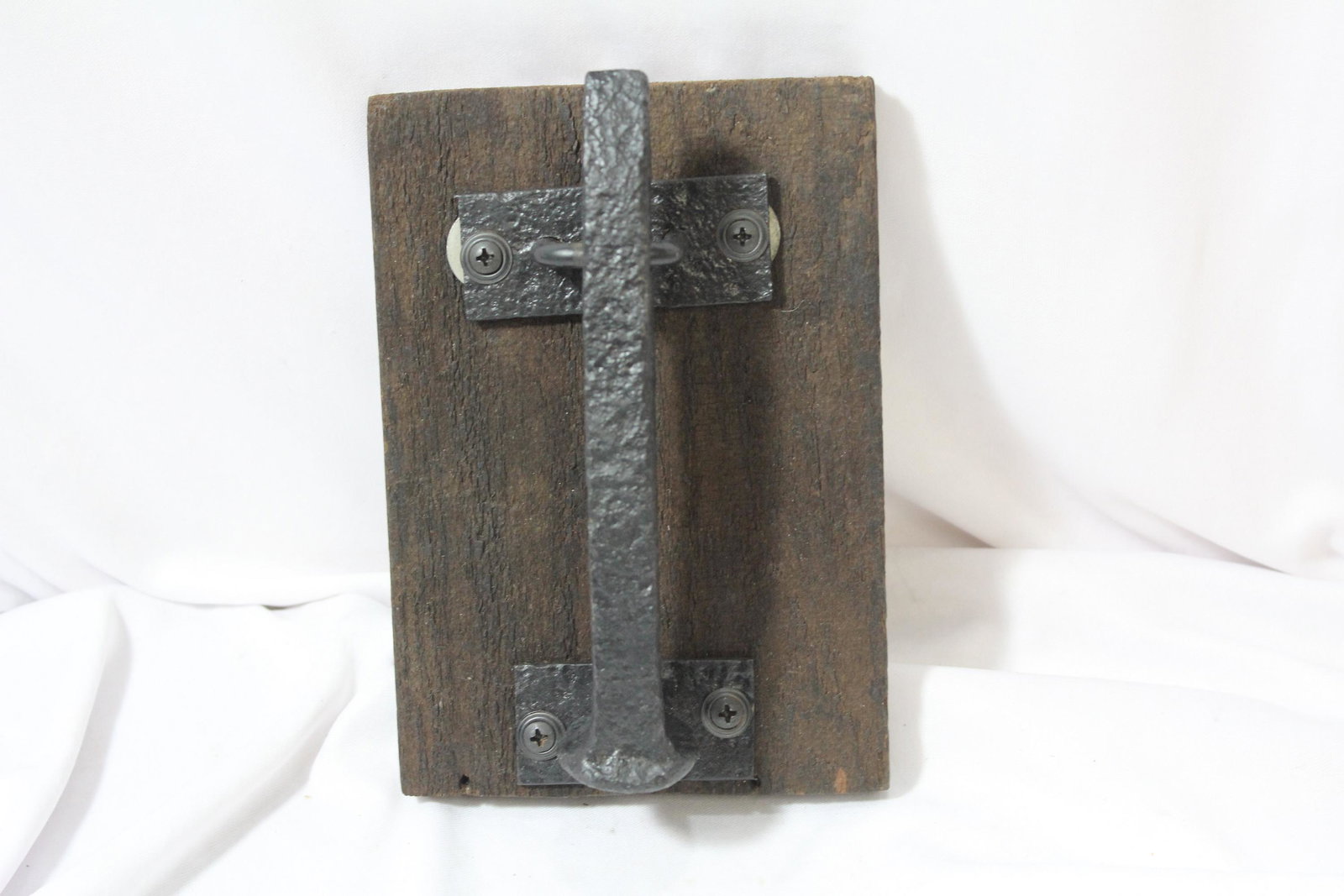 A Door Knocker: 7 1/8" across