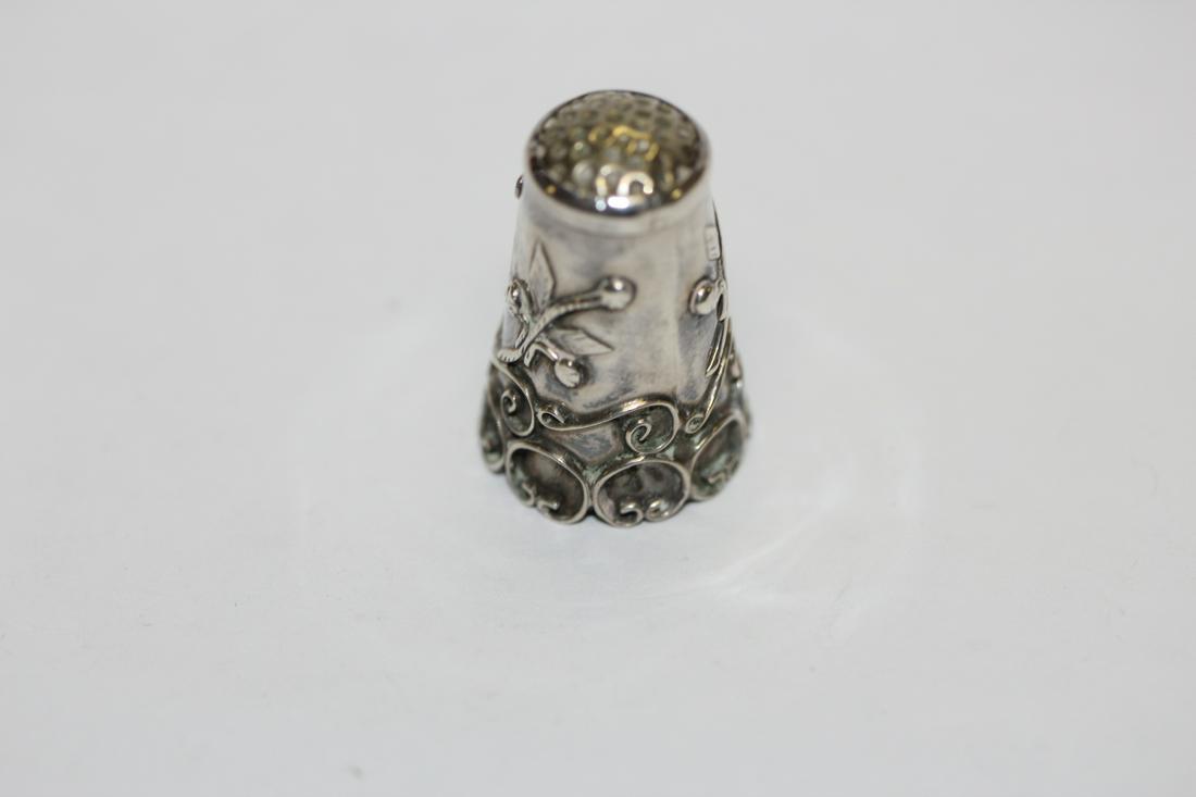 A Sterling Thimble: ornate