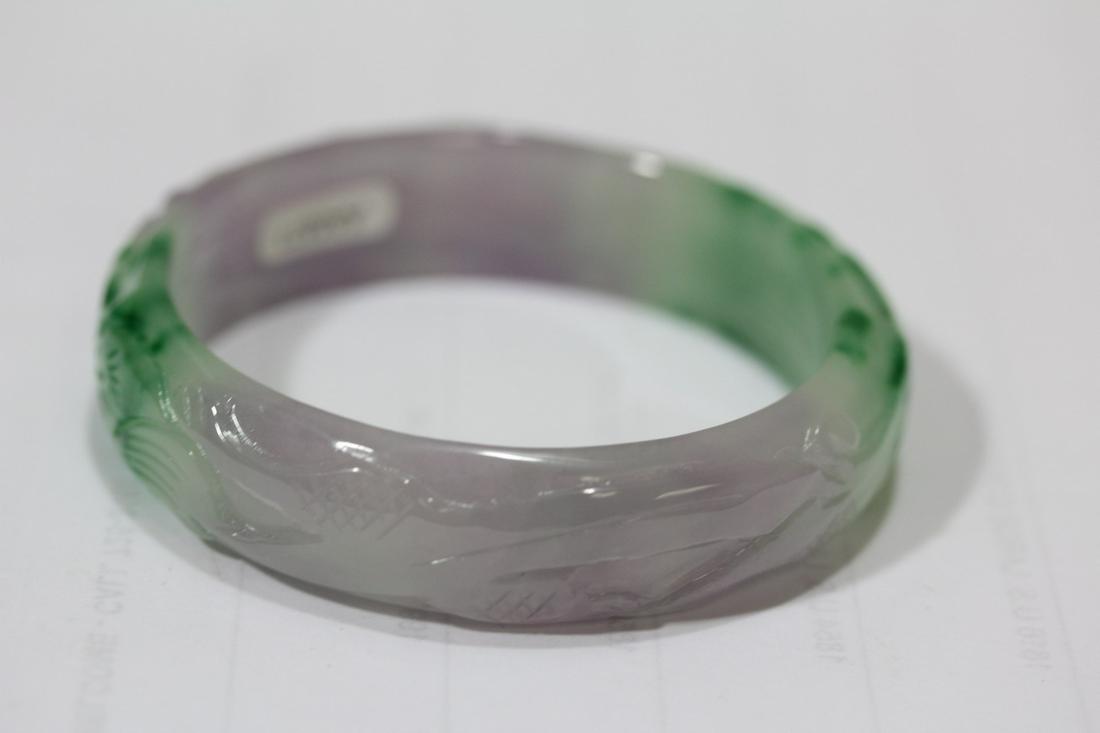 A Carved Lanveder and Green Jadeite Bnagle Bracelet: 2 1/4" inside diameter