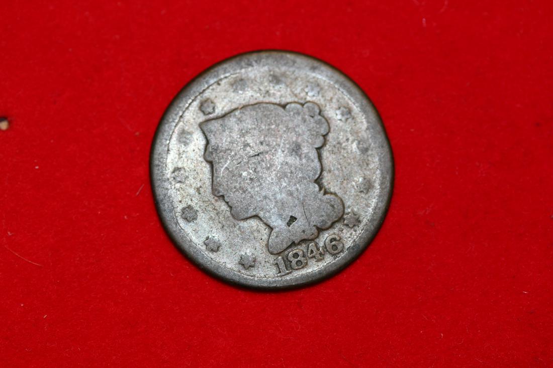 A Mint Error or a Novelty 1846 Half of a Large Cent: split in half as shown