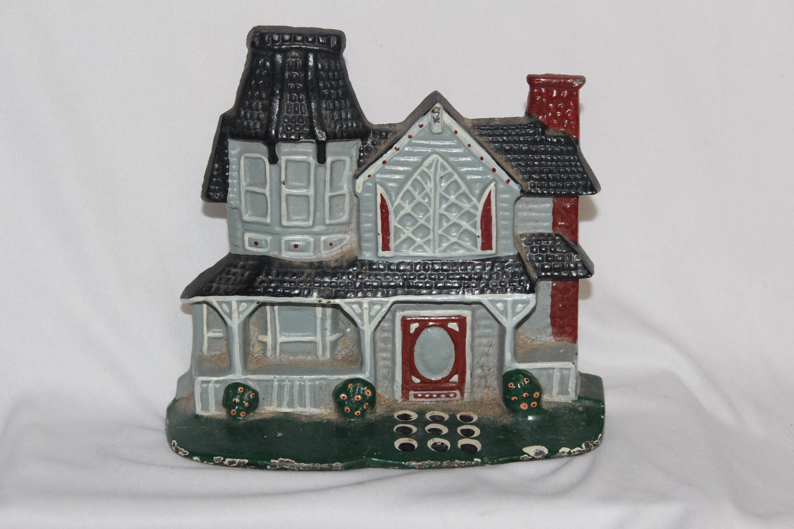 A Vintage Cast Iron Door Stopper: 6 1/2" tall