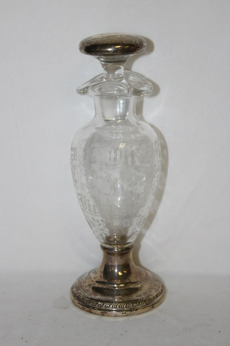 A Sterling Foot Decanter: with stopper - etched "oil" - 8 1/2" tall