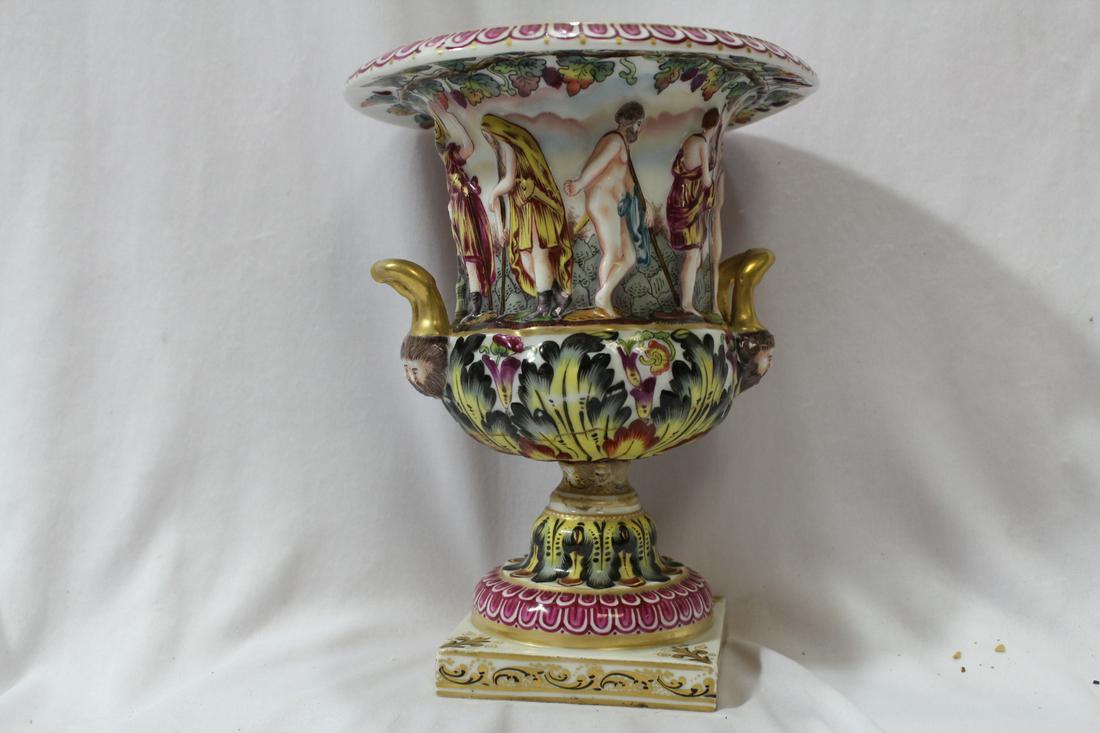 An Antique Capodimonte Urn: 8 1/4" tall - please note: restored as shown