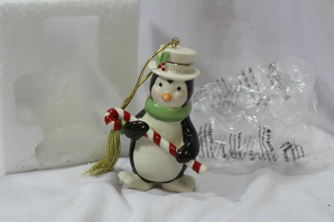 A Lenox Porcelain Christmas Ornament: approximately 4 1/2" tall - boxed