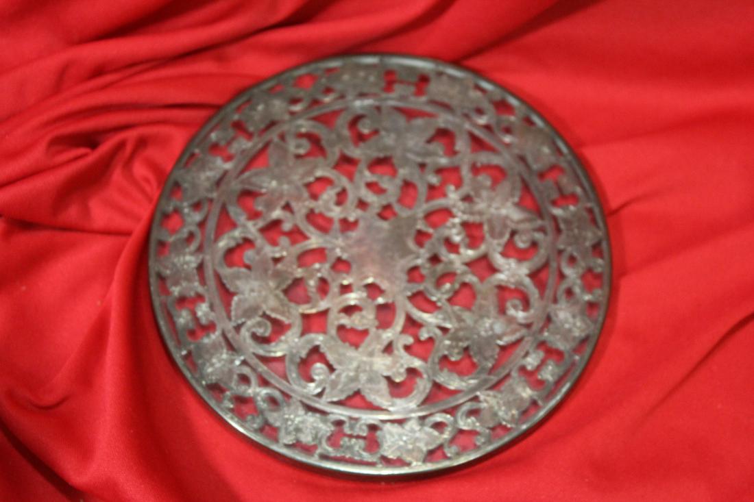 A Webstein Sterling silver Trivet: 6 inches in diameter