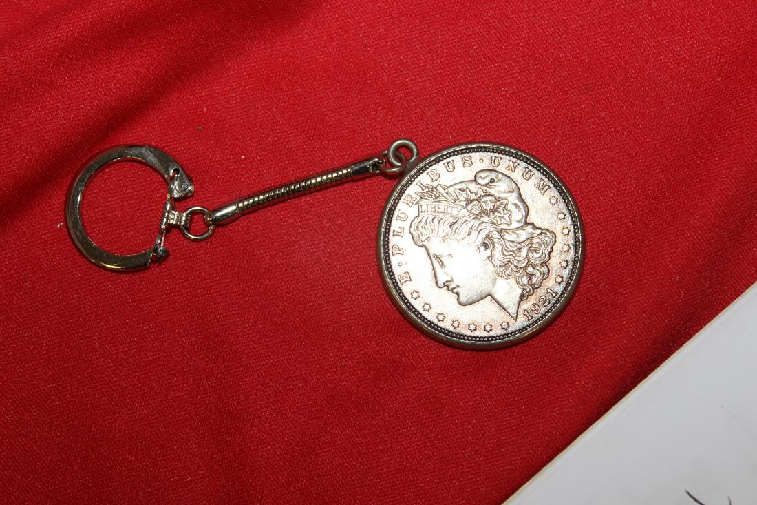 A 1921 Morgan Silver Dollar Keychain: as shown