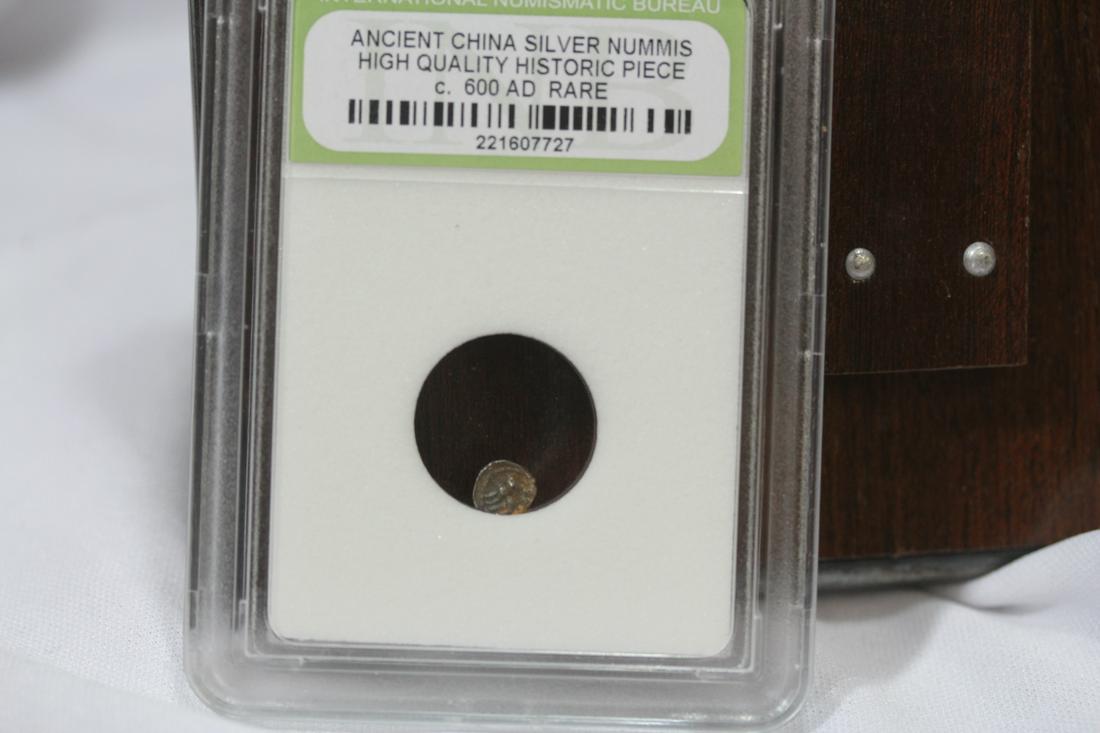 A Slabbed Ancient Chinese Silver Nummis: high quality - historic piece - c.600 - rare