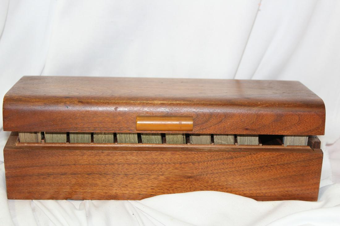 An Antique Bakelite and Wood Box: with playing cards inside - please note: hinges are cracked as sown - as found - box does not close completely - 10 5/8" long