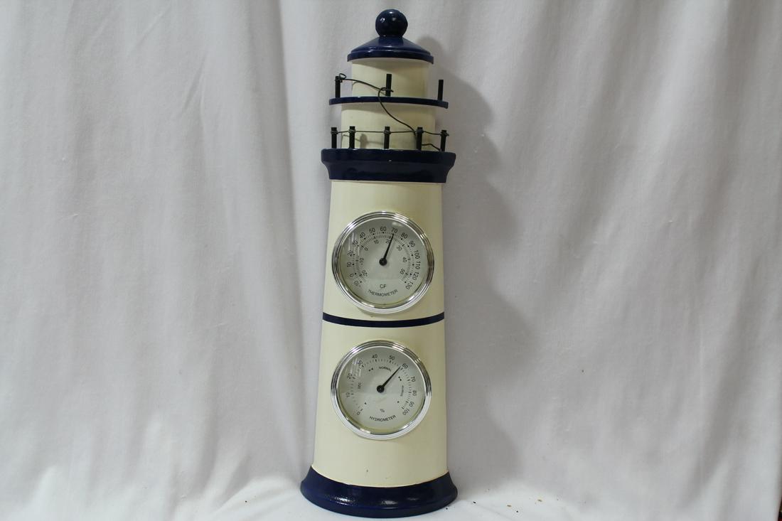 A Lighthouse Thermometer/Barometer: 15 3/4" tall