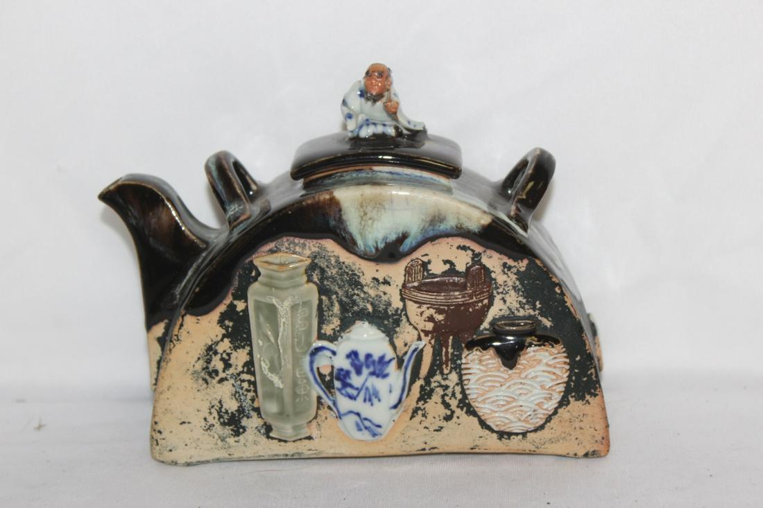 A Sumidagawa Japanese Teapot: no handle - 6 1/8" across