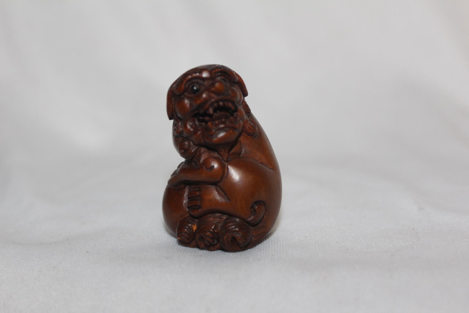 A Signed Japanese Wooden Netsuke: 1 3/4" tall