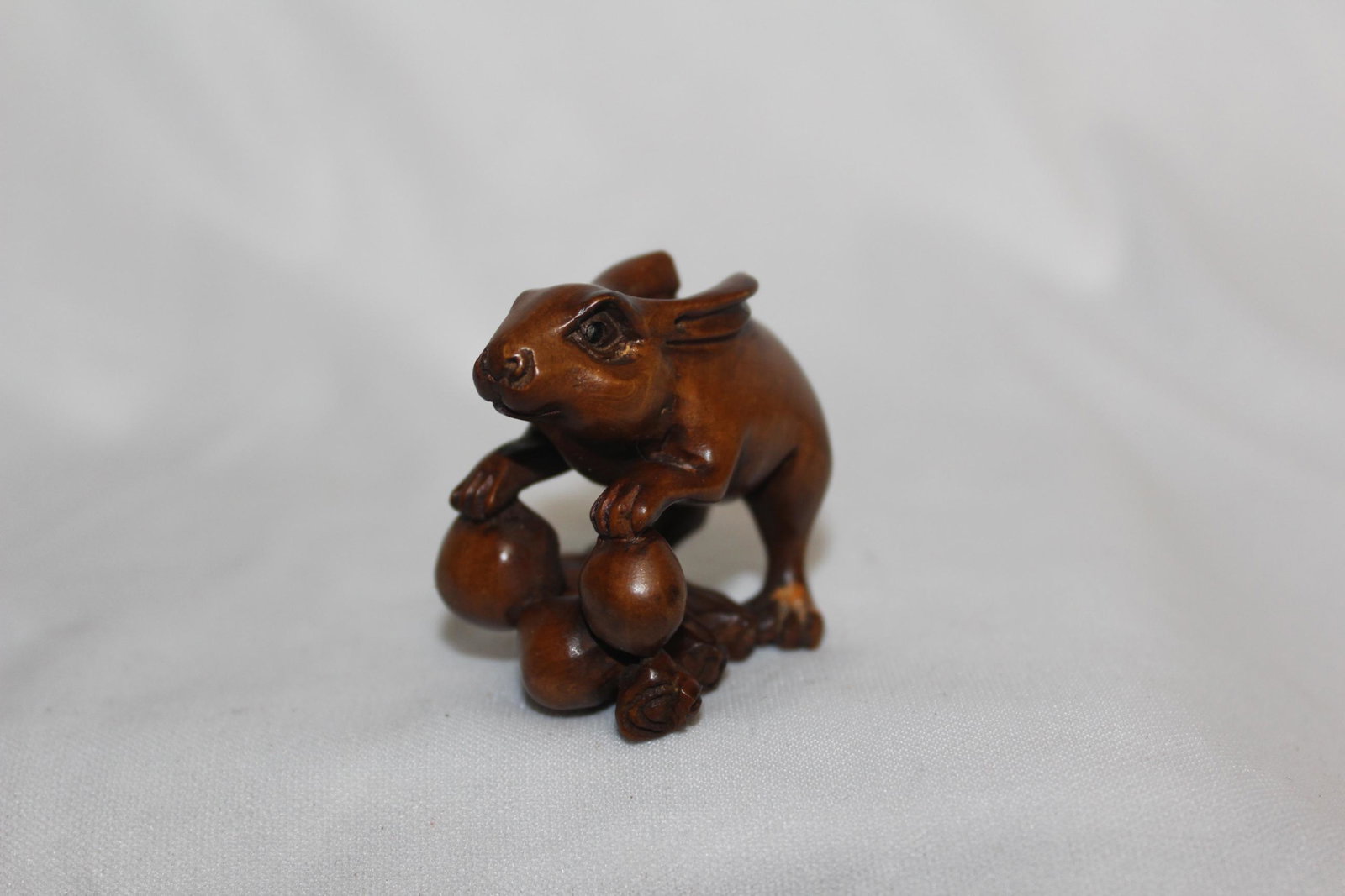 A Signed Japanese Wooden Netsuke: 1 3/4" wide