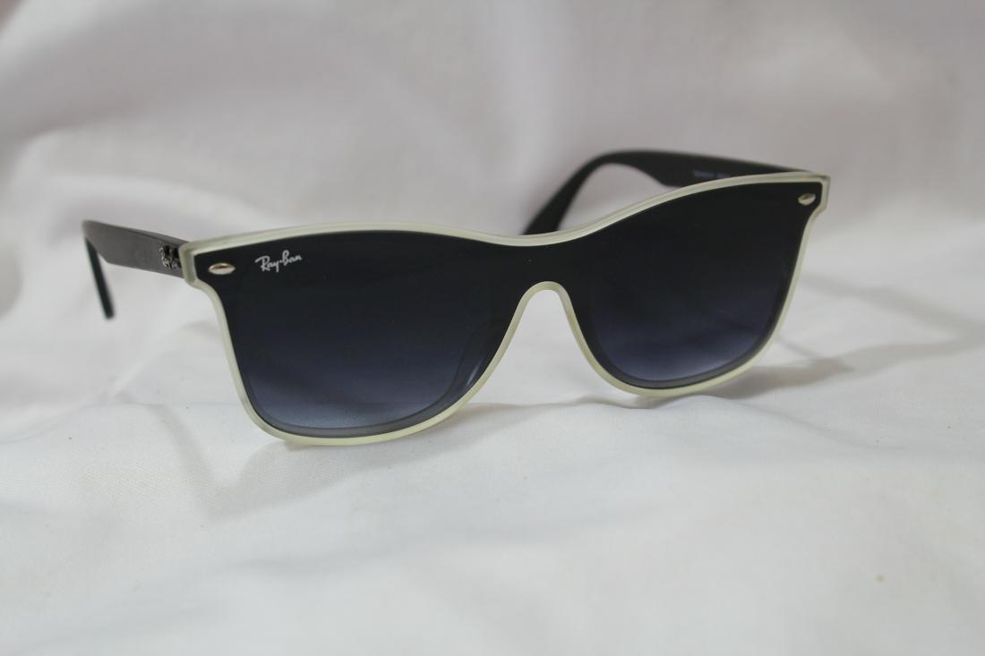A Rayban Sunglass with Case: cool looking