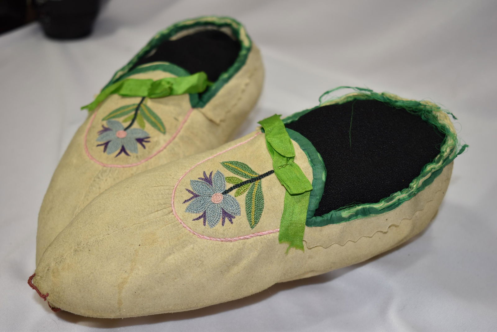 A Pair of Vintage Native American Leather Moccasins: probably 1930's - 9" across