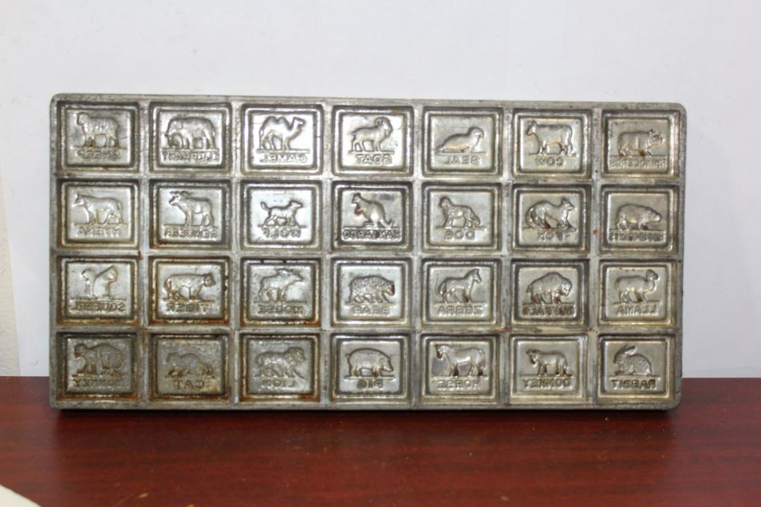 A Vintage Chocolate Mold: overall= 12" x 6"