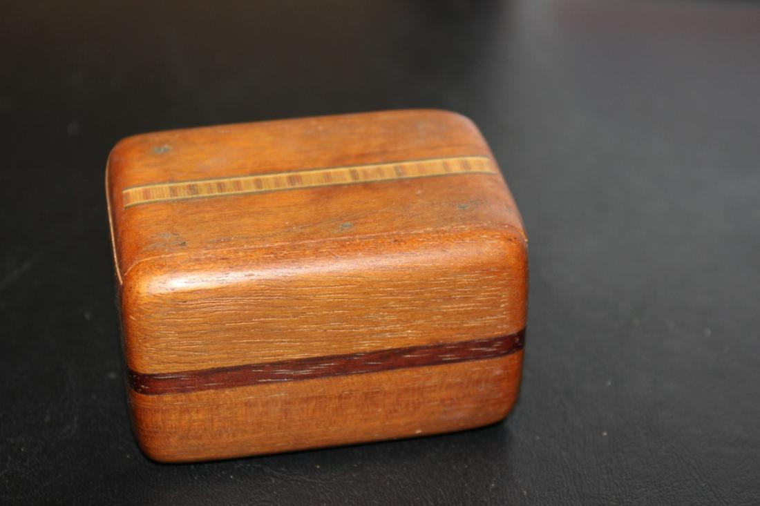 An Inlay Sliding Wood Box: 2 3/4" long x 1 3/4" tall