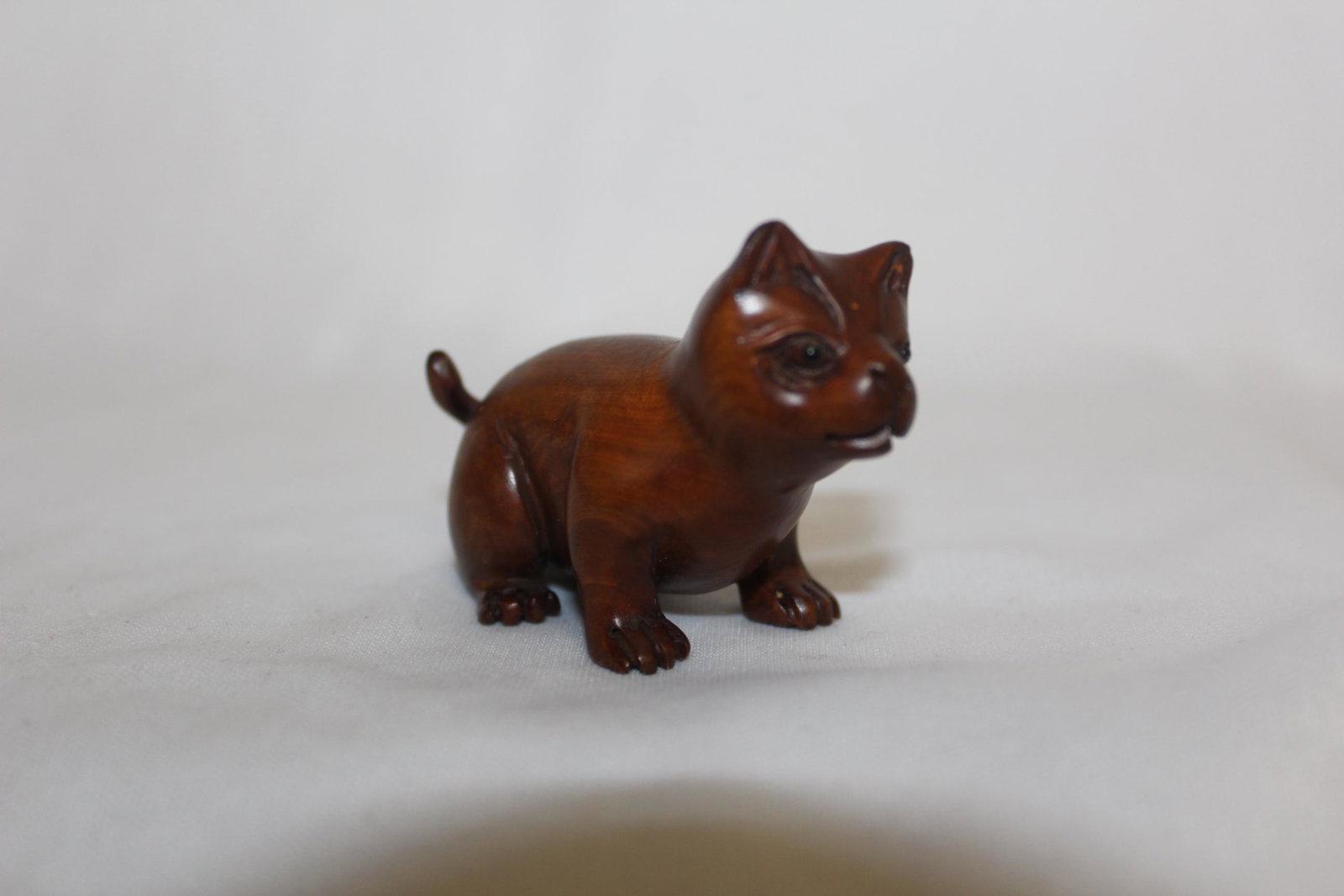 A Signed Japanese Wooden Netsuke: 2 5/8" long