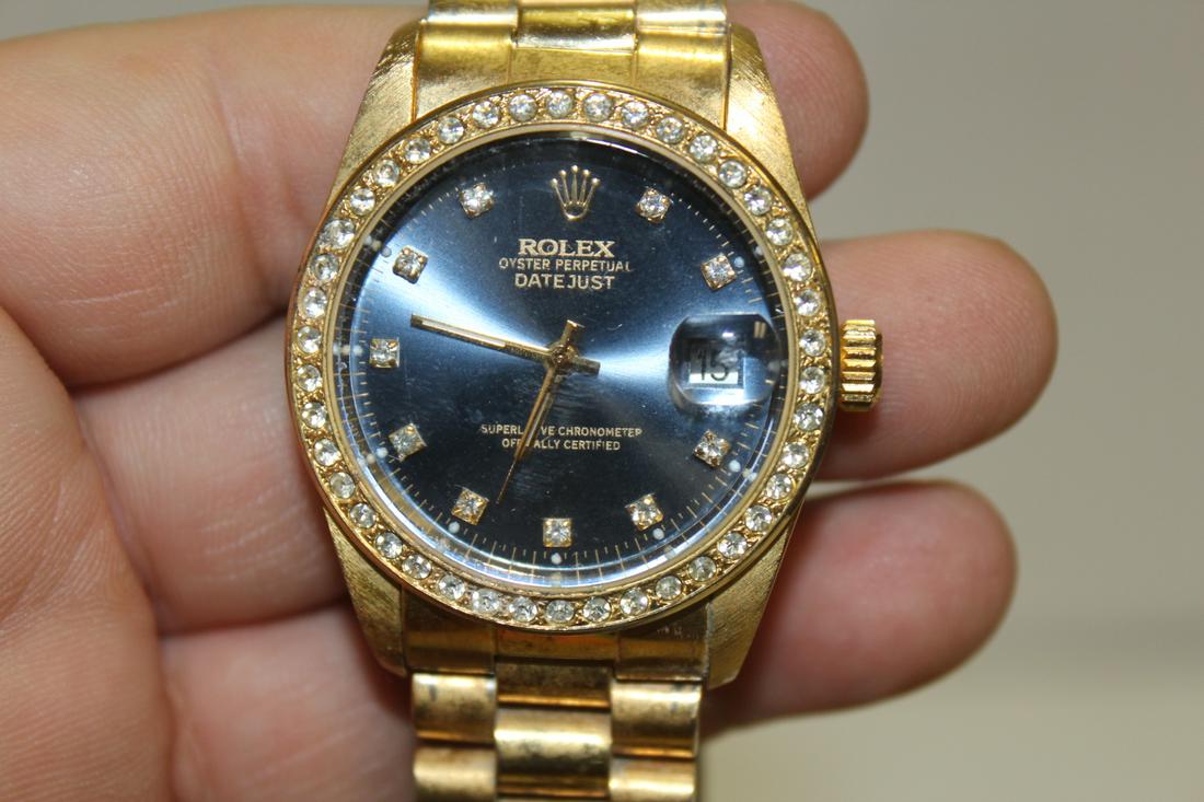 A Reproduction Rolex Watch: not authentic - currently working