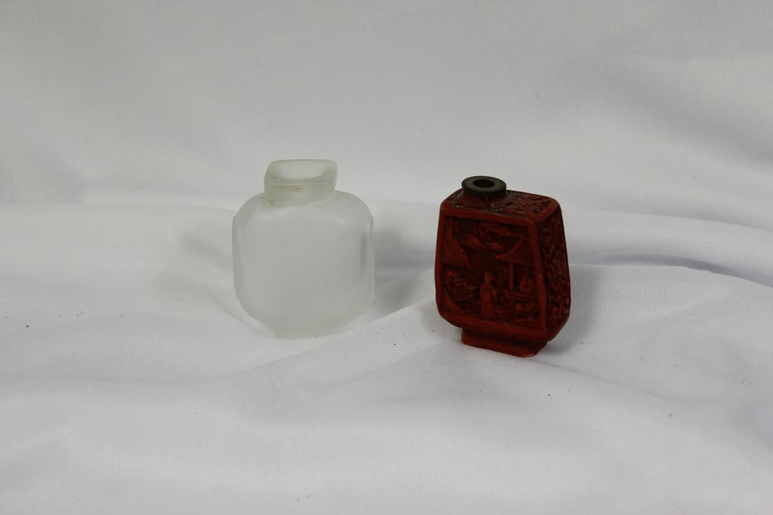 Lot of Two Perfume Bottle: one is a cinnabar - no stopper on either one - taller= 2 1/8"
