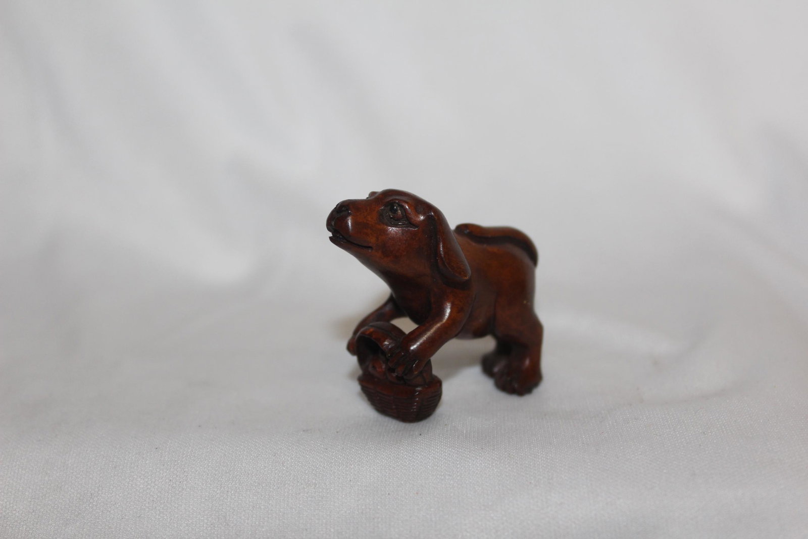 A Signed Japanese Wooden Netsuke: 1 3/4" wide