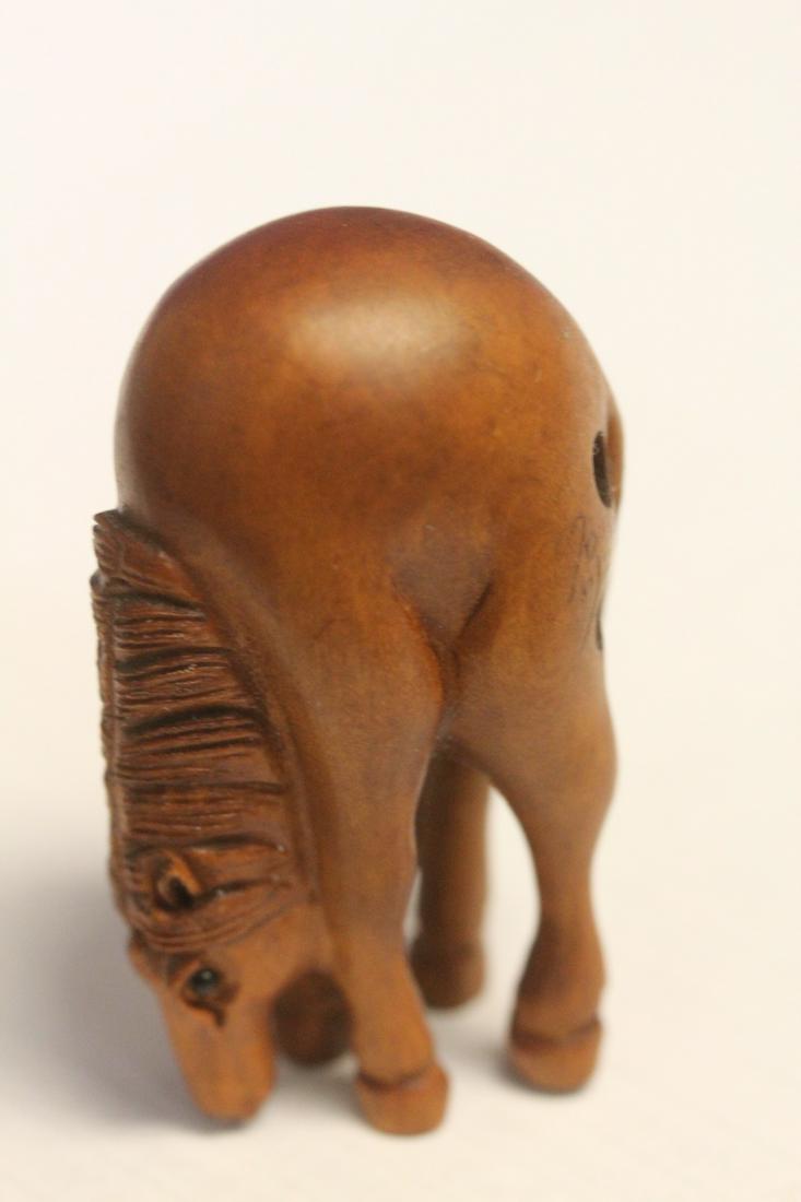 A Signed Japanese Wooden Netsuke: 2 1/4" tall