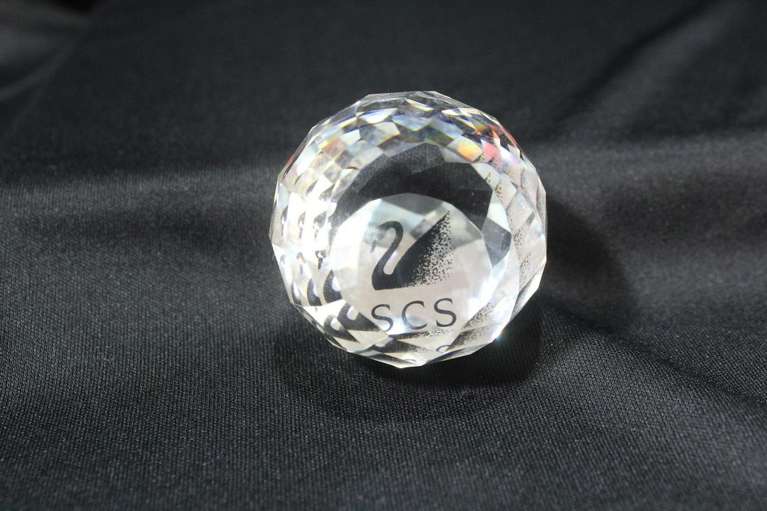 A Swarowsky Golf Ball Crystal Paperweight: 1 3/4" in diameter