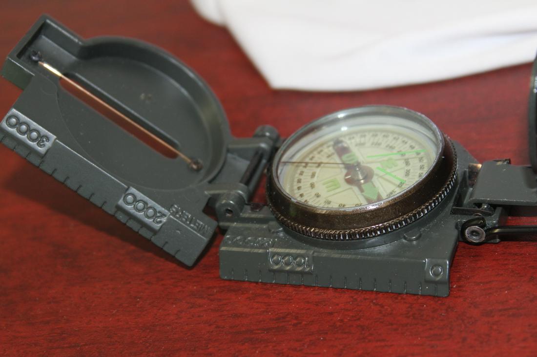 A Lensatic Compass: As shown on photos