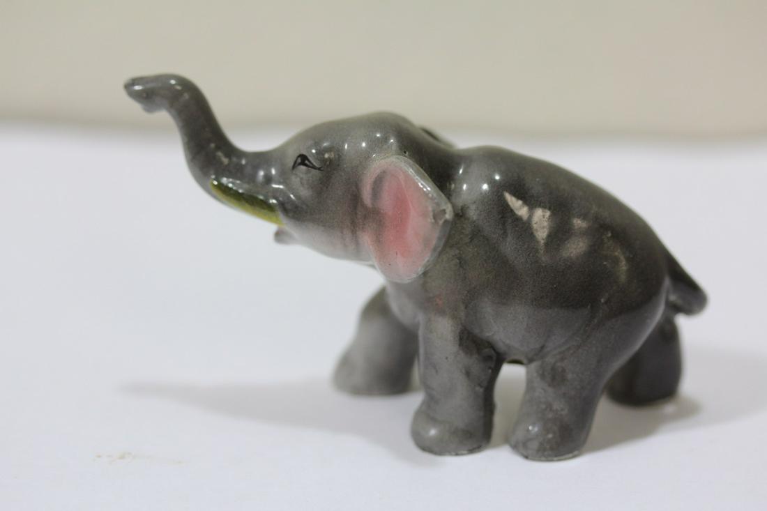 A Ceramic Elephant: 3" long