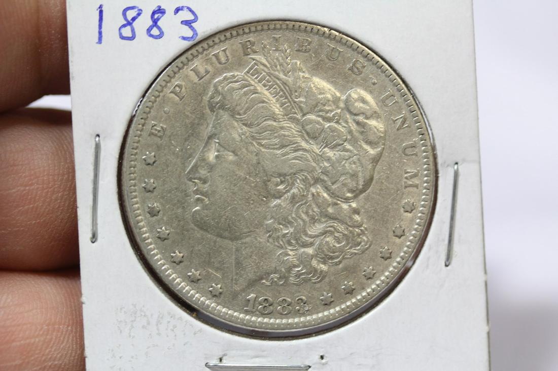 An 1883 Morgan Silver Dollar: as shown