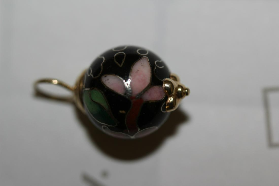 A 10 Karat Gold and Cloisonne Pendant: as shown