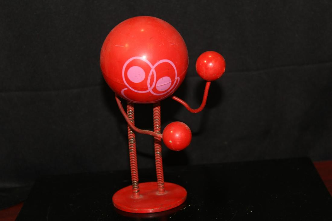 A Denmark Spring Man or Boxer: metal base - signed on the bottom - plastic face - mid century modern design - 7" tall