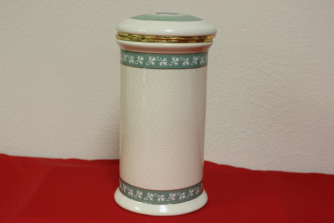 A Ceramic Cookie Jar: 10 1/2" tall - marked on the bottom - please note: lid is detached