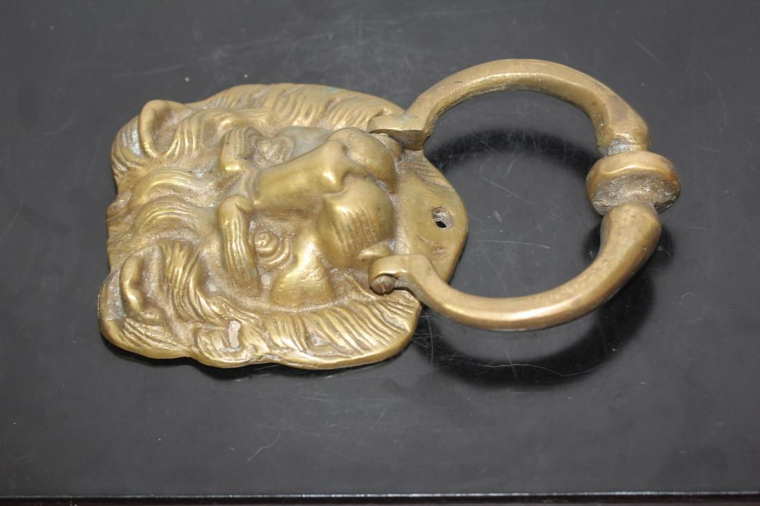 A Vintage Door Knocker: Lion motif - 7" long