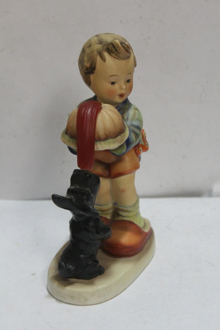 A Full Bee Hummel Figurine: 6 inches tall