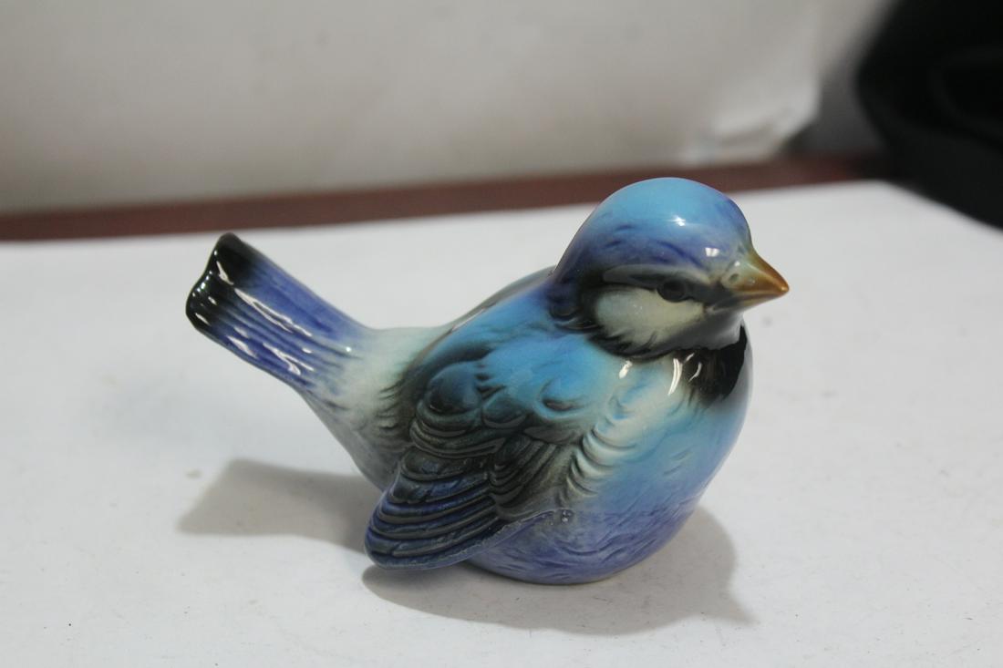 A Goebel Bird: 4 inches across