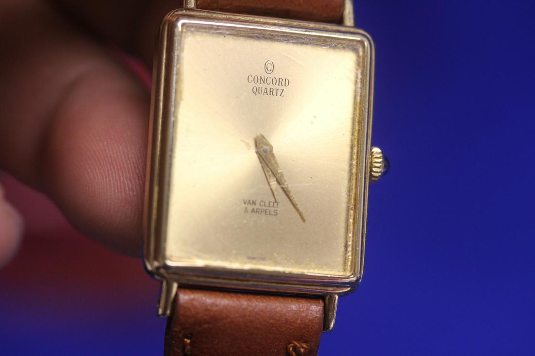 A Marked 14 Karat Gold Case Quartz Watch: marked Van Cleef and Arpels and Concord - currently running